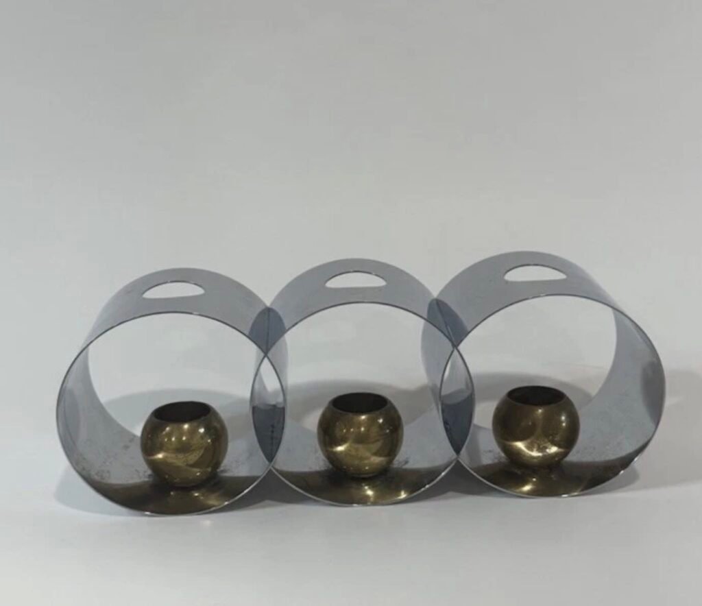 Set of three Helen Dryden Candlesphere candleholders in chrome and brass