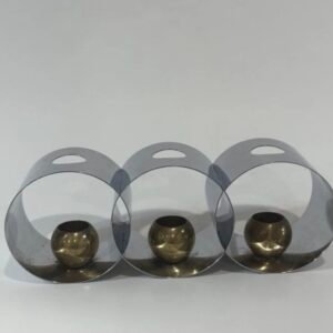 Set of three Helen Dryden Candlesphere candleholders in chrome and brass